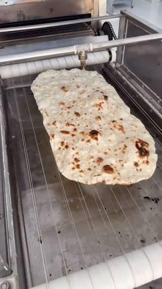 Sheets going into the hot oven